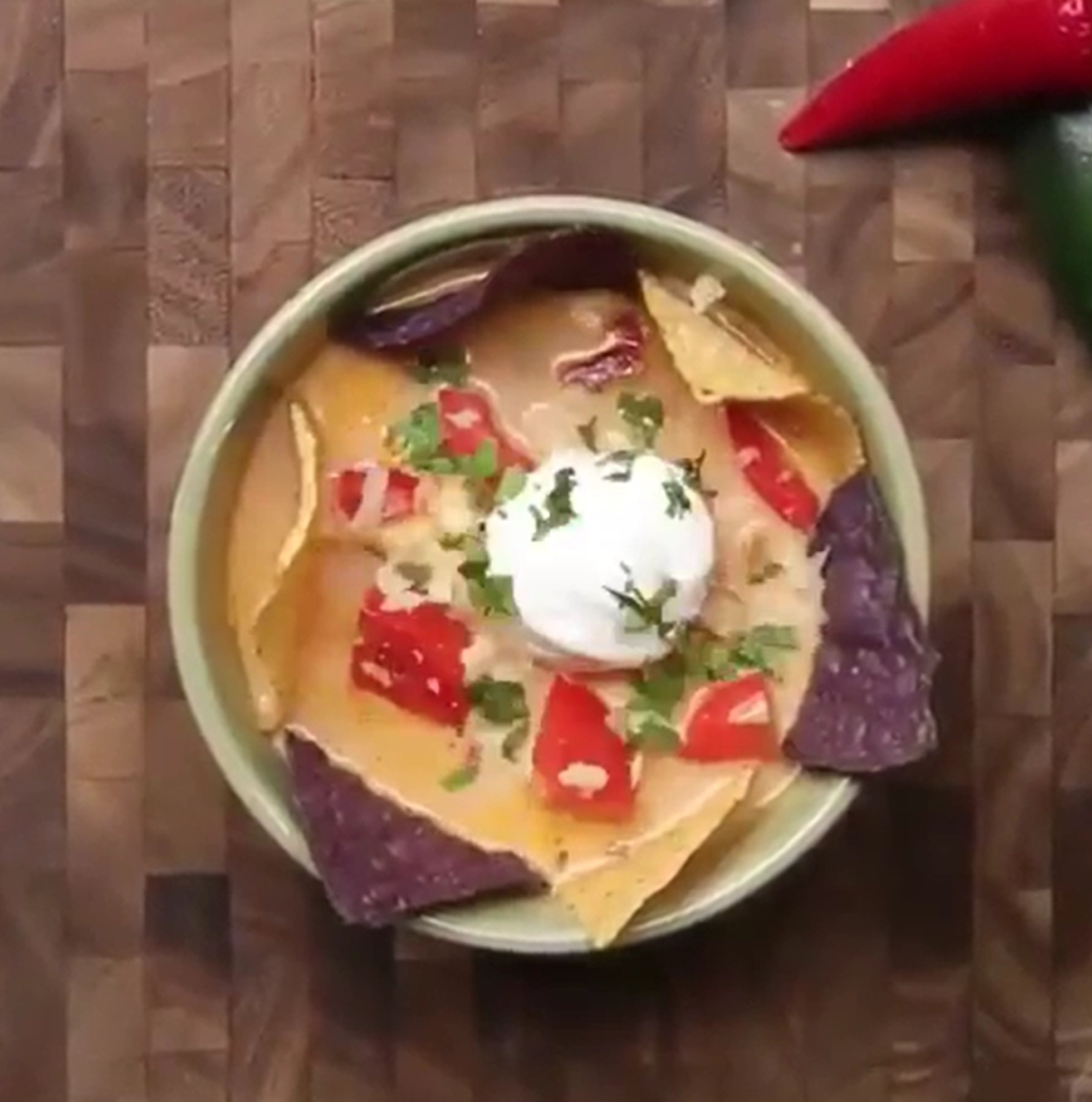 A Bowl of Taco Soup with Tortilla Chips